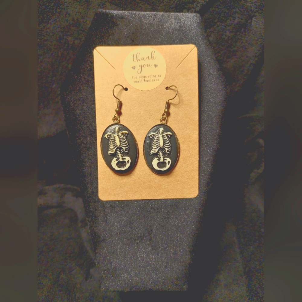 Handcrafted midsection bone earrings